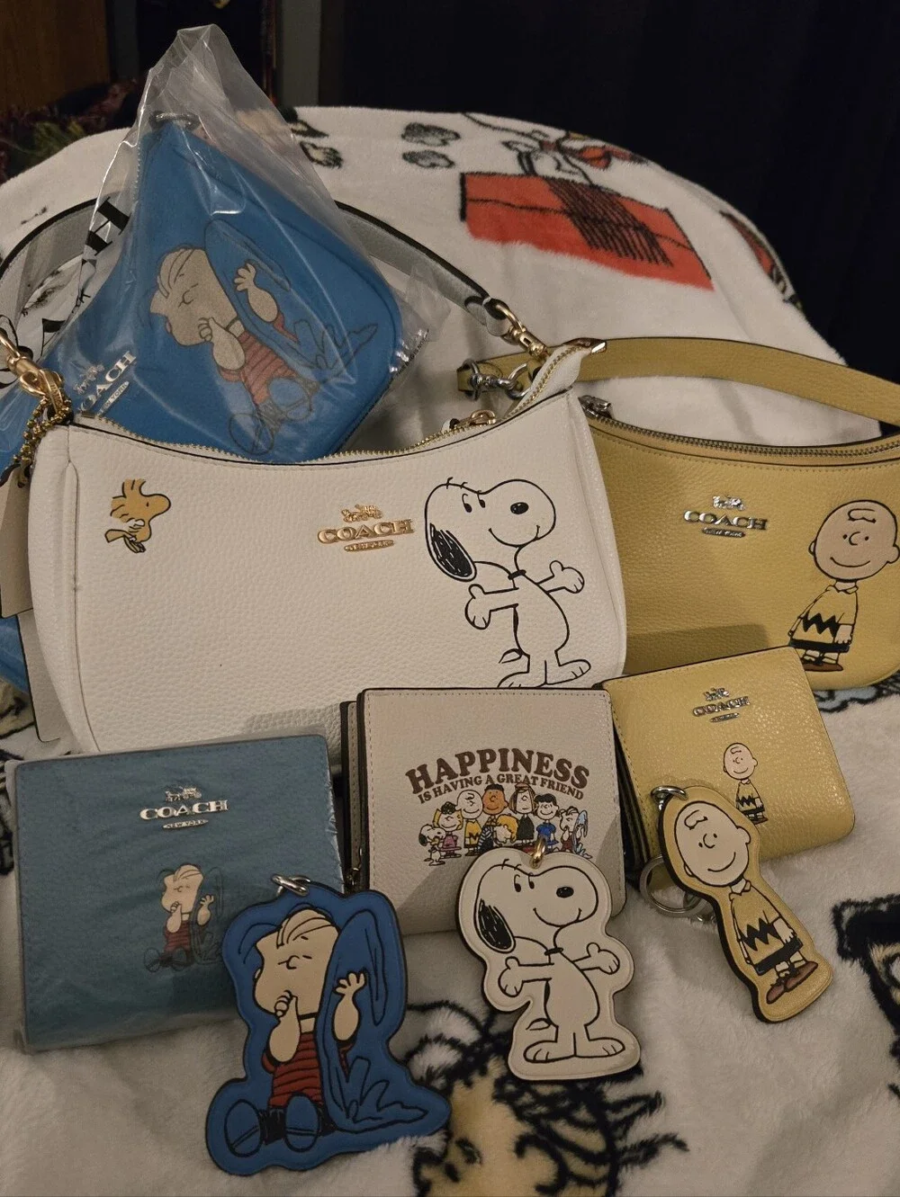 Coach Snoopy Collection Mini Bags & Wallets in White, Yellow, Blue, Cream